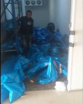 Habur'da bekletilen cenazelerle ilgili medyaya yansıyan fooğrafta, cenazelerin üst üste yığıldığı görülüyor