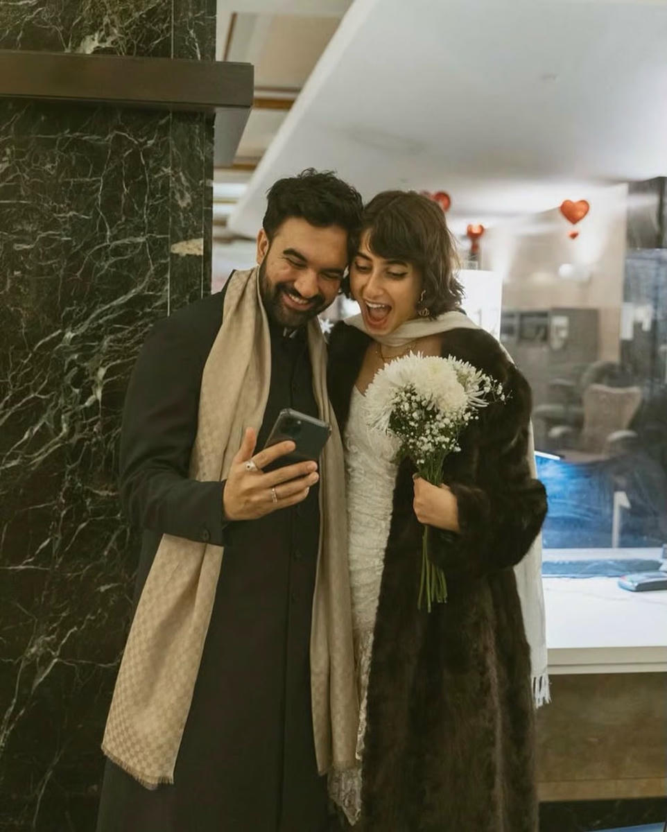 Mamdani karısı ile 